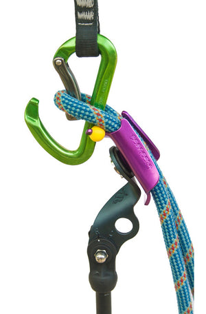 Photo of purple Pongoose Climber 700 being used to clip a climbing rope into a quickdraw.