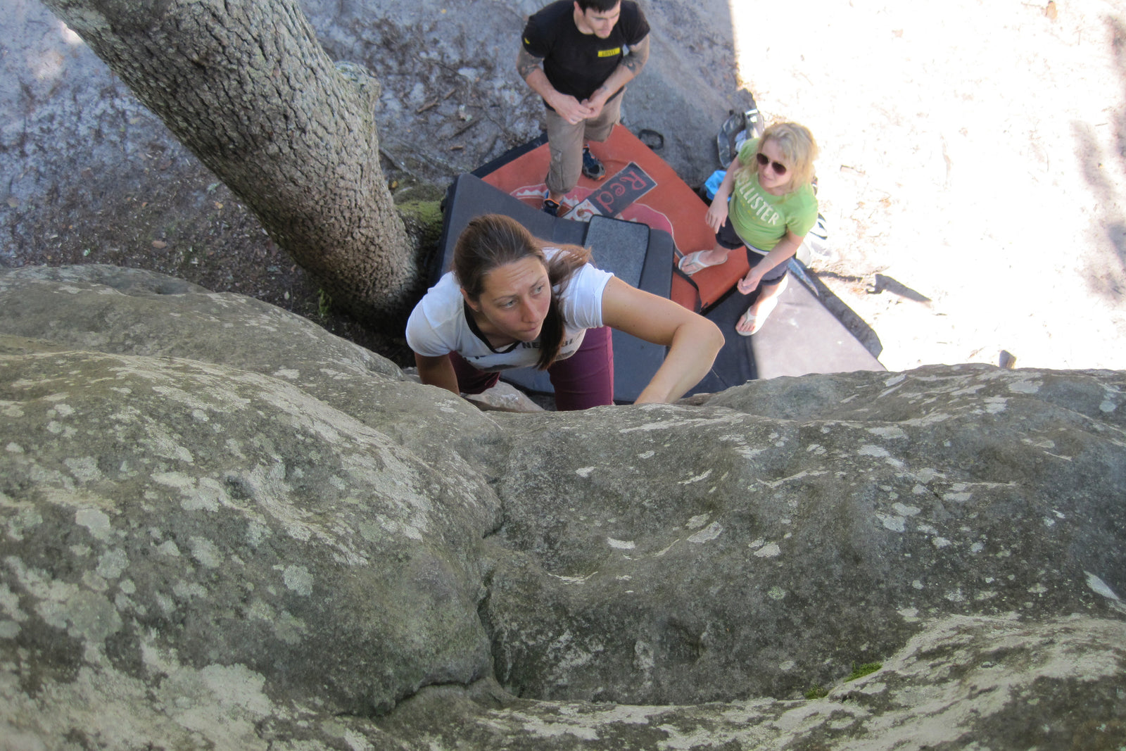 Katie Rendall bouldering with Pongoose in Fontainbleau, France.