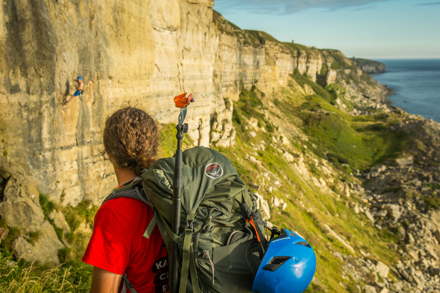 Pongoose Blog - Transitioning from indoor to outdoor climbing. Image of climber on cliffs at Portland, UK.