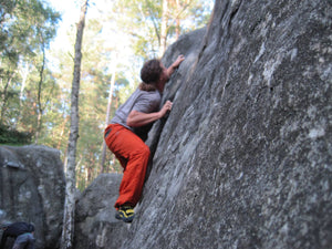 Pongoose founder Rob Rendall bouldering at Fontainebleau, France.   