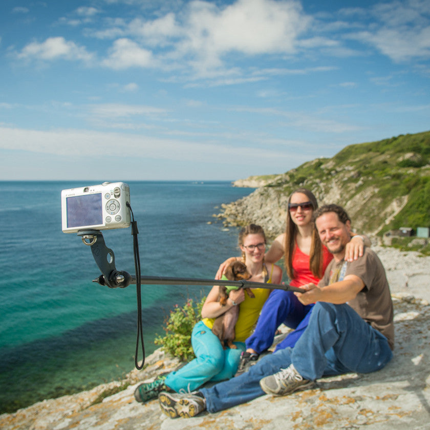 Pongoose Climber 700 pictured as a camera boom with small digital camera attached to take selfie of climbers at Portland, UK.