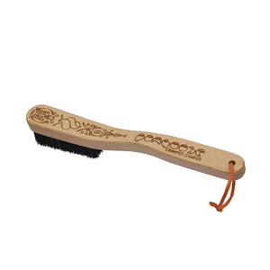 Pongoose Crimper-Dimper climbing and bouldering brush image - manufactured in the UK with beech wood and horse hair bristles, and a unique laser etched design.